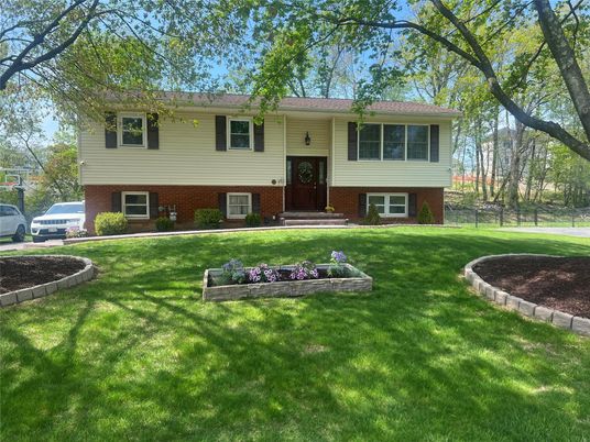 Exterior, Facade, Brick Facade, Raised Ranch