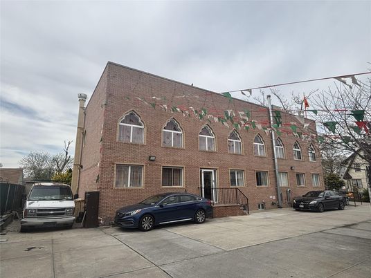 Exterior, Facade, Brick Facade, Condo Building