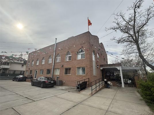 Exterior, Facade, Brick Facade, Condo Building
