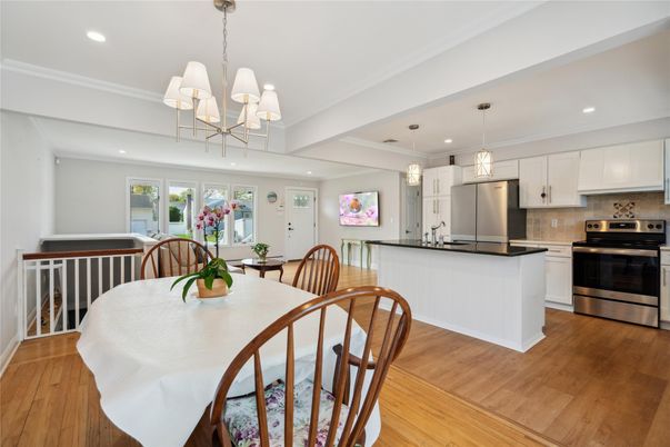 Chandelier, Dining room, Interior, Kitchen, Pendant Lights, Recessed Lighting, Stainless Steel Appliances, Wood Texture Flooring