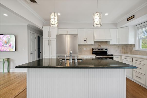 Interior, Kitchen, Pendant Lights, Recessed Lighting, Stainless Steel Appliances, Wood Texture Flooring