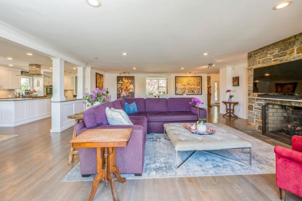 Fireplace, Interior, Living room, Recessed Lighting, Stone Walls, Wood Texture Flooring