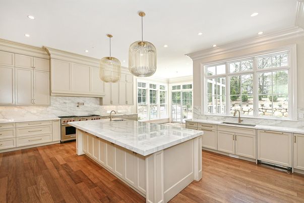 Interior, Kitchen, Marble Walls, Pendant Lights, Recessed Lighting, Stainless Steel Appliances, Wood Texture Flooring