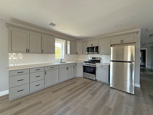 Interior, Kitchen, Recessed Lighting, Stainless Steel Appliances, Wood Texture Flooring