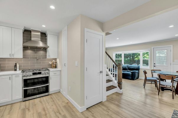 Dining room, Interior, Kitchen, Recessed Lighting, Stainless Steel Appliances, Wood Texture Flooring