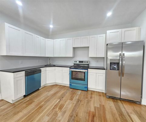 Interior, Kitchen, Recessed Lighting, Stainless Steel Appliances, Wood Texture Flooring