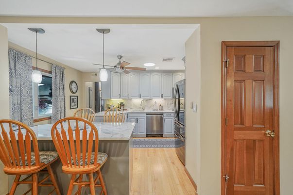 Interior, Kitchen, Pendant Lights, Recessed Lighting, Stainless Steel Appliances, Wood Texture Flooring