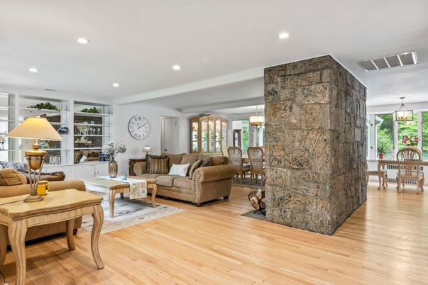 Dining room, Interior, Living room, Recessed Lighting, Stone Walls, Wood Texture Flooring