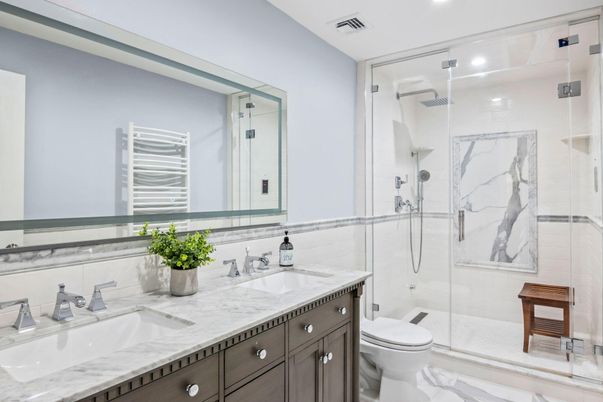 Bathroom, Dual Sink Vanities, Glass Shower, Interior, Marble, Marble Walls, Recessed Lighting