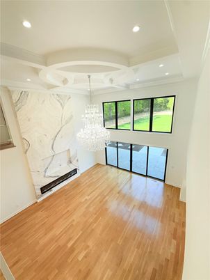 Chandelier, Empty room, Interior, Marble Walls, Recessed Lighting, Wood Texture Flooring