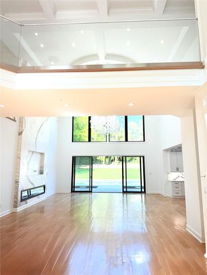 Empty room, Fireplace, Interior, Marble Walls, Recessed Lighting, Wood Texture Flooring