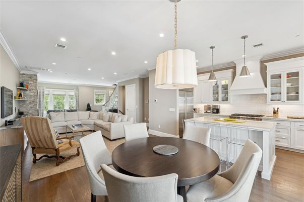 Dining room, Fireplace, Interior, Kitchen, Living room, Pendant Lights, Recessed Lighting, Stainless Steel Appliances, Stone Walls, Wood Texture Flooring