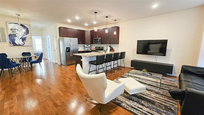 Dining room, Interior, Kitchen, Living room, Pendant Lights, Recessed Lighting, Stainless Steel Appliances, Wood Texture Flooring