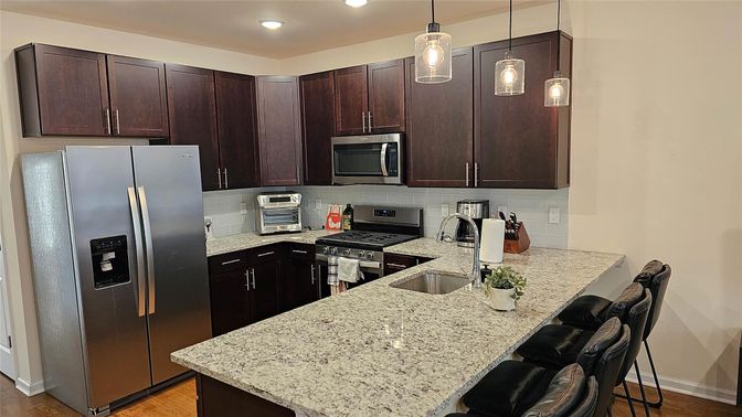 Interior, Kitchen, Pendant Lights, Recessed Lighting, Stainless Steel Appliances, Wood Texture Flooring