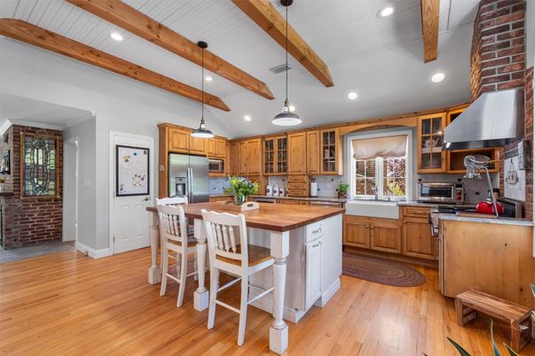 Interior, Kitchen, Pendant Lights, Recessed Lighting, Stainless Steel Appliances, Stone Walls, Wooden Beams, Wood Texture Flooring