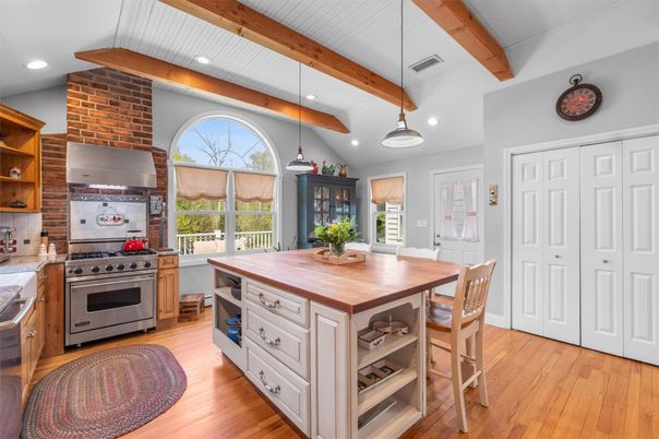 Interior, Kitchen, Pendant Lights, Recessed Lighting, Stainless Steel Appliances, Stone Walls, Wooden Beams, Wood Texture Flooring