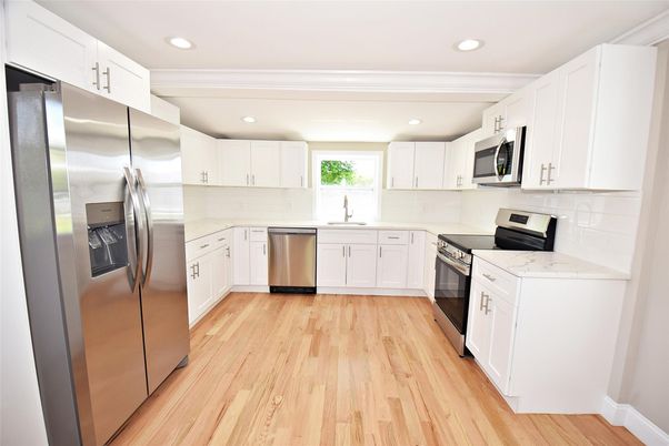 Interior, Kitchen, Recessed Lighting, Stainless Steel Appliances, Wood Texture Flooring