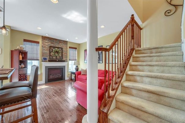 Fireplace, Interior, Pendant Lights, Recessed Lighting, Stone Walls, Wood Texture Flooring