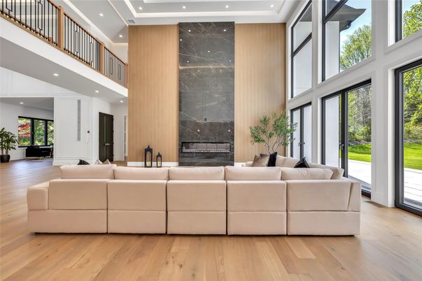 Fireplace, Interior, Living room, Marble Walls, Recessed Lighting, Wood Texture Flooring