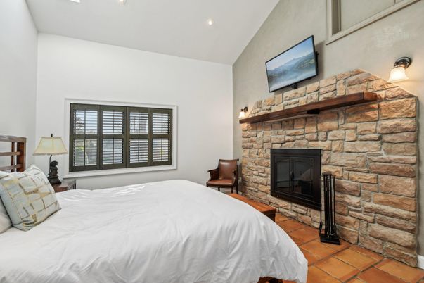 Bedroom, Fireplace, Interior, Recessed Lighting, Stone Walls