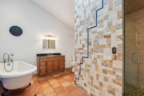 Bathroom, Free Standing Baths, Glass Shower, Interior, Stone Walls