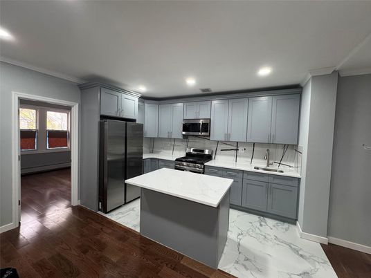 Interior, Kitchen, Marble, Recessed Lighting, Stainless Steel Appliances, Wood Texture Flooring