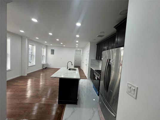 Interior, Kitchen, Marble, Recessed Lighting, Stainless Steel Appliances, Wood Texture Flooring
