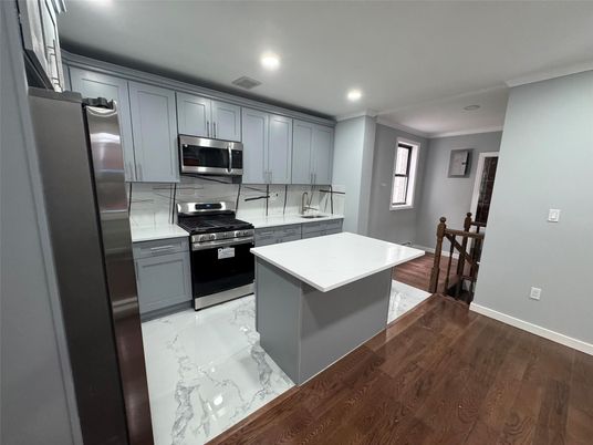 Interior, Kitchen, Marble, Recessed Lighting, Stainless Steel Appliances, Wood Texture Flooring