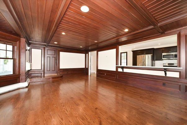 Empty room, Interior, Kitchen, Recessed Lighting, Stainless Steel Appliances, Wooden Ceilings, Wood Texture Flooring