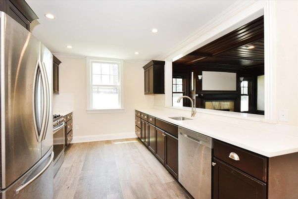 Fireplace, Interior, Kitchen, Recessed Lighting, Stainless Steel Appliances, Wood Texture Flooring