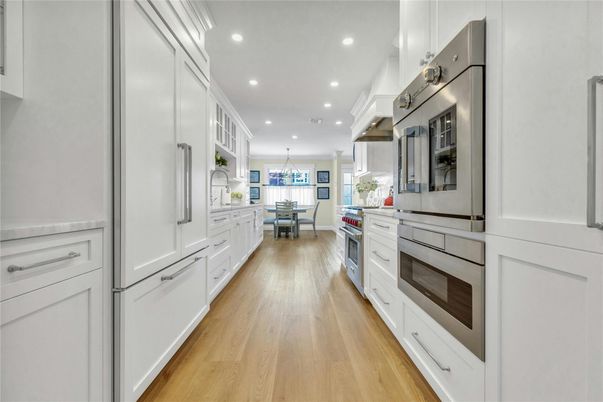 Dining room, Interior, Kitchen, Pendant Lights, Recessed Lighting, Stainless Steel Appliances, Wood Texture Flooring