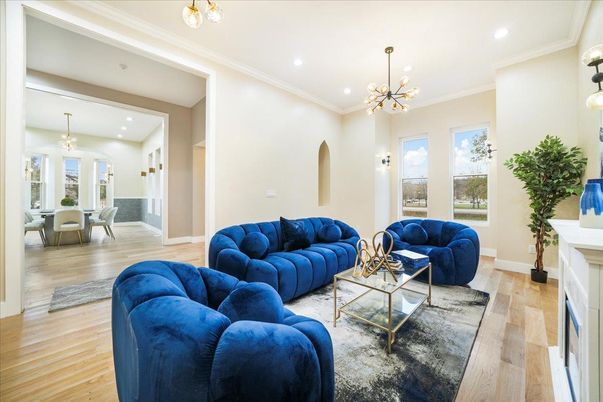Dining room, Fireplace, Interior, Living room, Pendant Lights, Recessed Lighting, Wood Texture Flooring