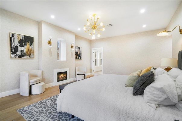 Bedroom, Fireplace, Interior, Pendant Lights, Recessed Lighting, Wood Texture Flooring