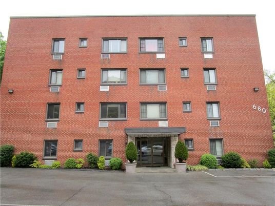 Exterior, Facade, Brick Facade, Condo Building