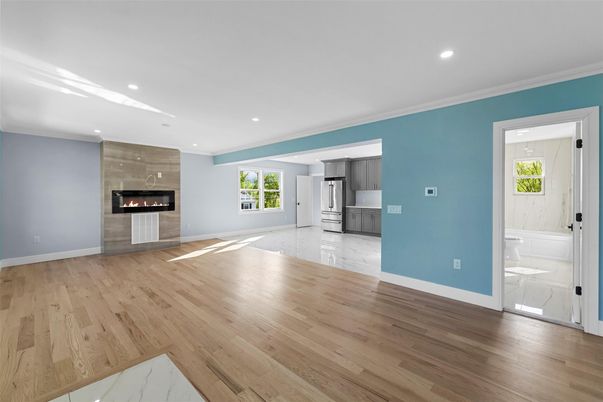Empty room, Fireplace, Interior, Kitchen, Marble, Recessed Lighting, Wood Texture Flooring