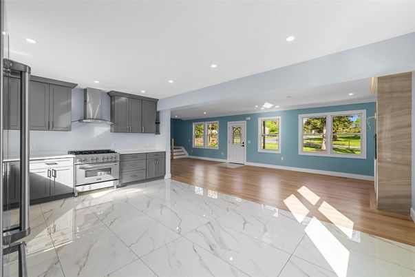 Interior, Kitchen, Marble, Recessed Lighting, Stainless Steel Appliances, Wood Texture Flooring