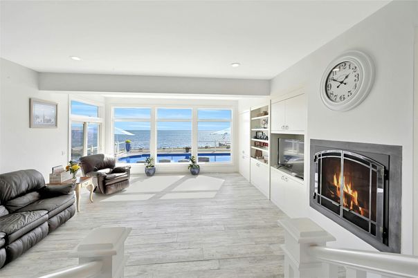 Fireplace, Interior, Living room, Recessed Lighting, Water, Wood Texture Flooring