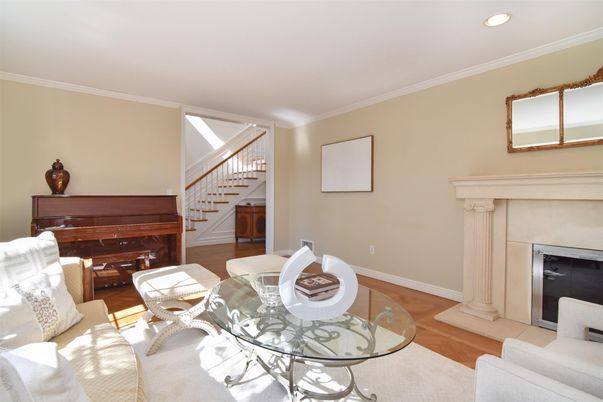 Fireplace, Interior, Living room, Piano, Recessed Lighting, Wood Texture Flooring