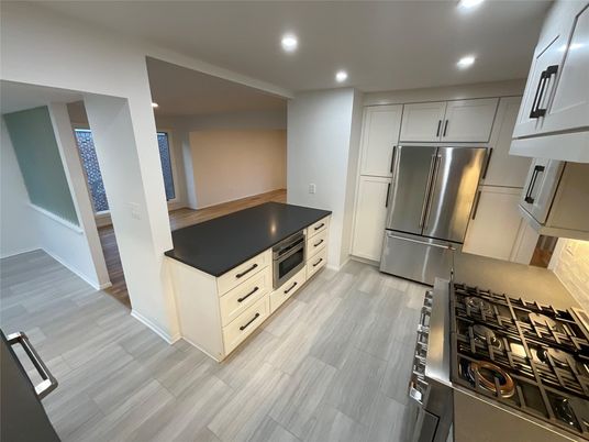 Interior, Kitchen, Recessed Lighting, Stainless Steel Appliances, Wood Texture Flooring