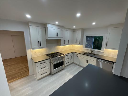 Interior, Kitchen, Recessed Lighting, Stainless Steel Appliances, Wood Texture Flooring