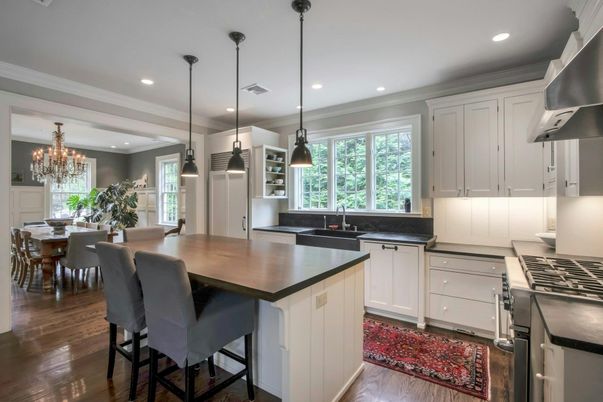 Chandelier, Dining room, Interior, Kitchen, Pendant Lights, Recessed Lighting, Stainless Steel Appliances, Wood Texture Flooring