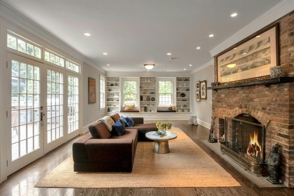 Fireplace, Interior, Living room, Recessed Lighting, Stone Walls, Wood Texture Flooring