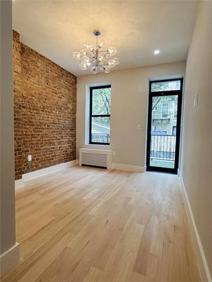 Empty room, Interior, Pendant Lights, Recessed Lighting, Stone Walls, Wood Texture Flooring