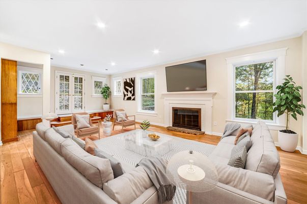 Fireplace, Interior, Living room, Recessed Lighting, Wood Texture Flooring