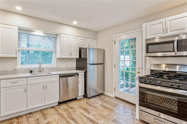 Interior, Kitchen, Recessed Lighting, Stainless Steel Appliances, Wood Texture Flooring