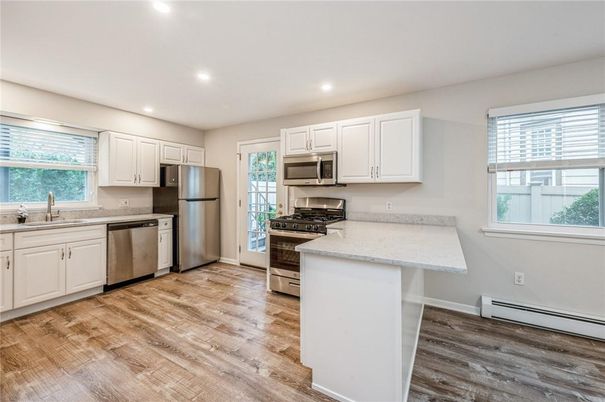 Interior, Kitchen, Recessed Lighting, Stainless Steel Appliances, Wood Texture Flooring