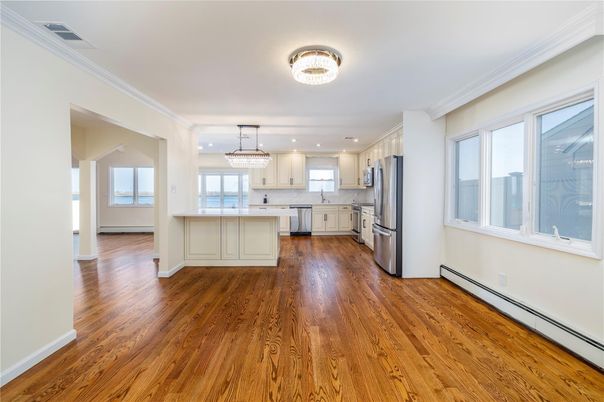Chandelier, Interior, Kitchen, Recessed Lighting, Stainless Steel Appliances, Wood Texture Flooring