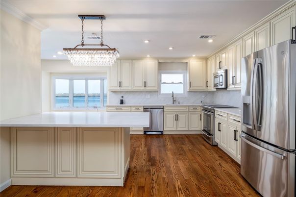 Chandelier, Interior, Kitchen, Recessed Lighting, Stainless Steel Appliances, Wood Texture Flooring