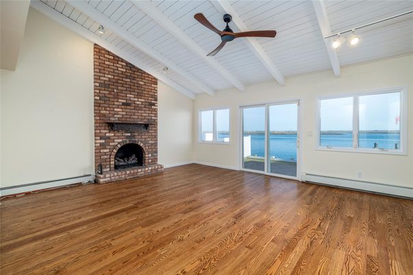 Empty room, Fireplace, Interior, Stone Walls, Water, Wood Texture Flooring