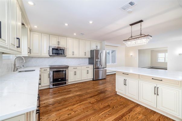 Chandelier, Interior, Kitchen, Recessed Lighting, Stainless Steel Appliances, Wood Texture Flooring